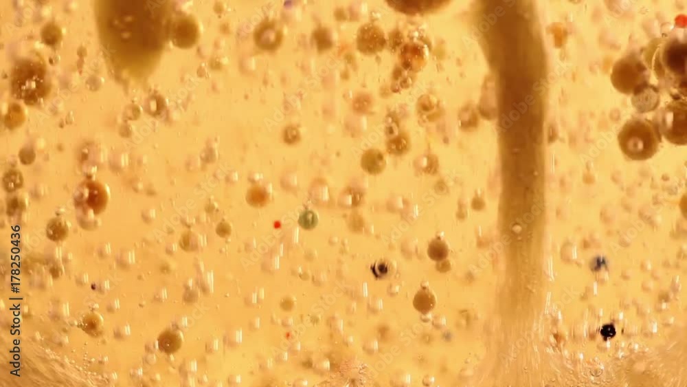 Effervescent mix of oil, water and colorful ink. Moving bubbles
Effervescent mix of oil, water and colorful ink. Moving bubbles