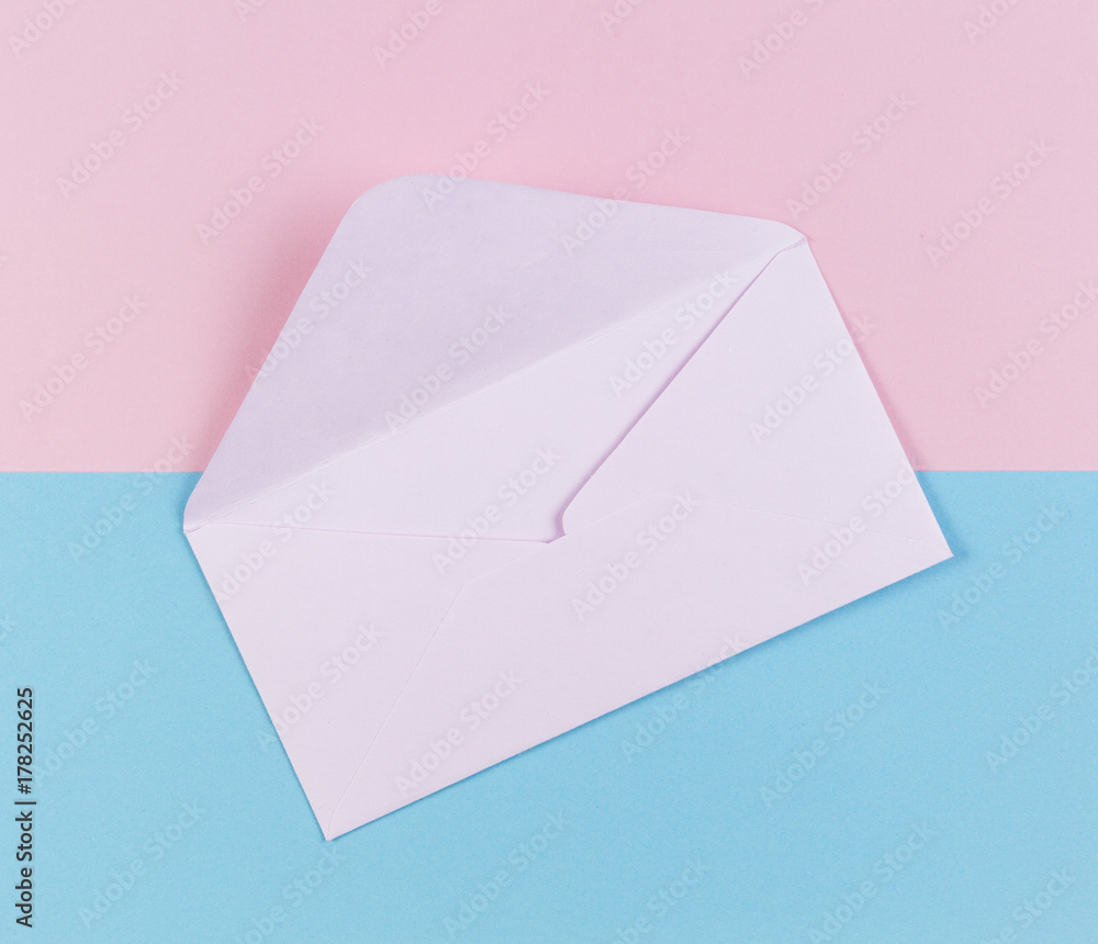 Open envelope on colored pink and blue background Open envelope on colored pink and blue background