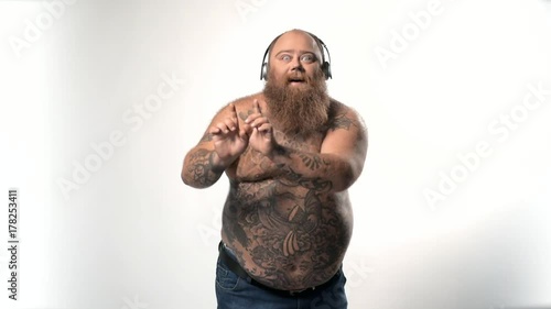 Man listening to music from headphones