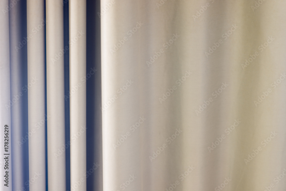 Background of a curtain of a gray color Background of a curtain of a gray color