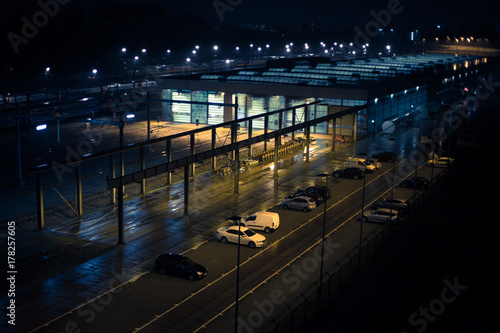 Cinematic looking warehouse with cars at night