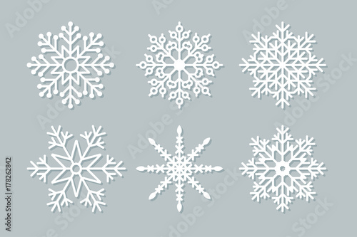 Set of six geometric Christmas snowflakes and stars. Vector illustration.