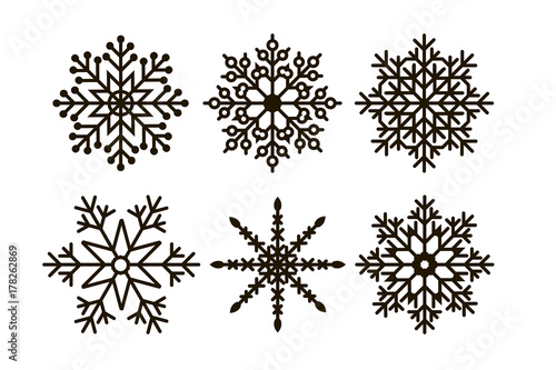 Set of six geometric Christmas snowflakes and stars. Vector illustration.