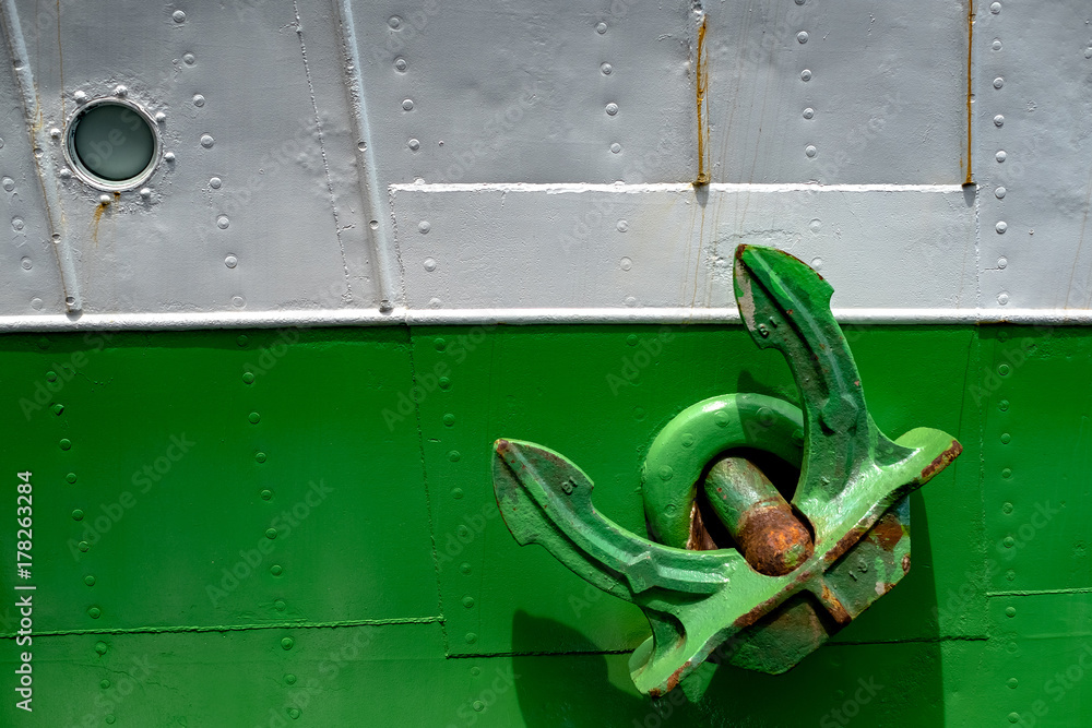 Fototapeta premium Ship heavy old metal anchor on the side of the boat.