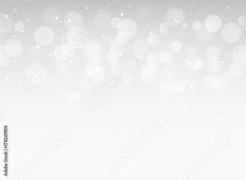 Abstract gray light bokeh xmas card glitter decoration. Christmas shiny sky pattern background