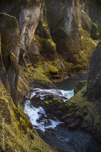 A wild and deep Fjarrglifur canyon located in the southern Iceland
