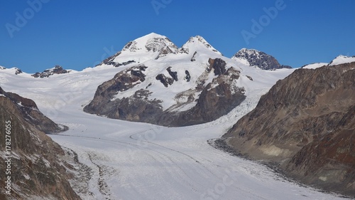 Distant view of the Jungfraujoch. Aletsch glacier. Eiger and Monch, high mountains in Switzerland.