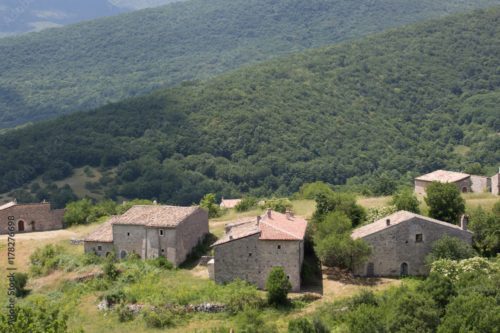 Ancient restored houses in an abandoned mountain village, Central Italy
