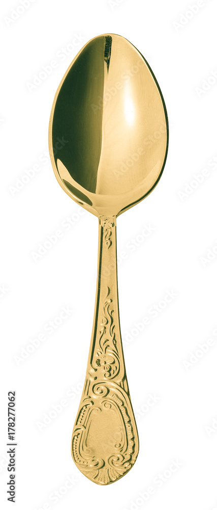 Golden metal spoon on the white background.