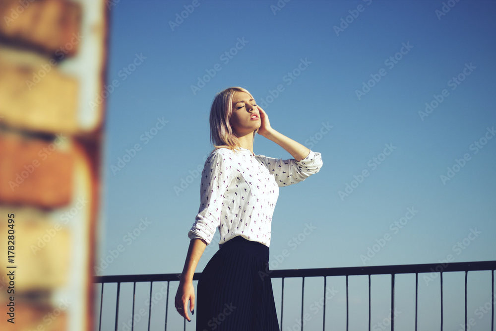 Model posing in urban surroundings. Model posing in urban surroundings.