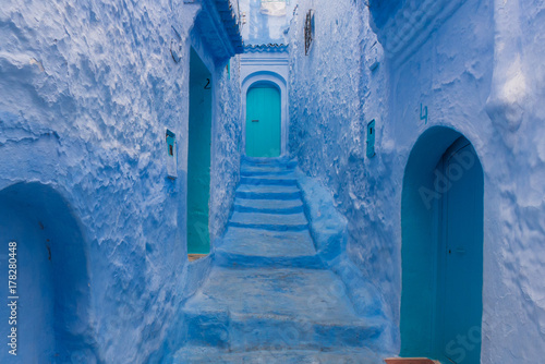 Blue houses of Chefchauen, in Morocco. A public alley where everything is blue. photo