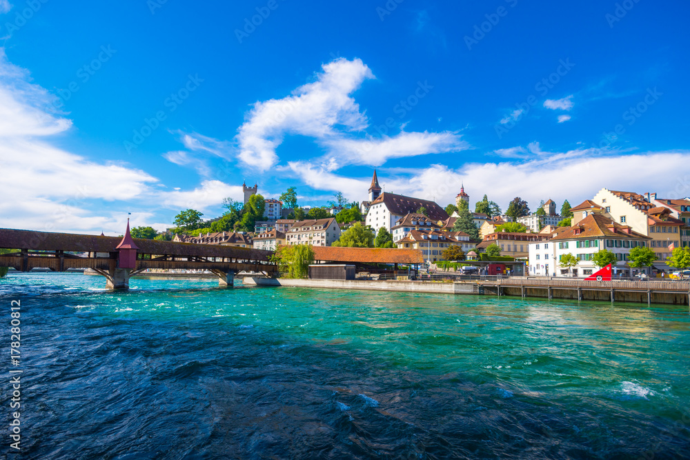 Cityscape of Lucerne with river and bridge in the evening, Switzerland