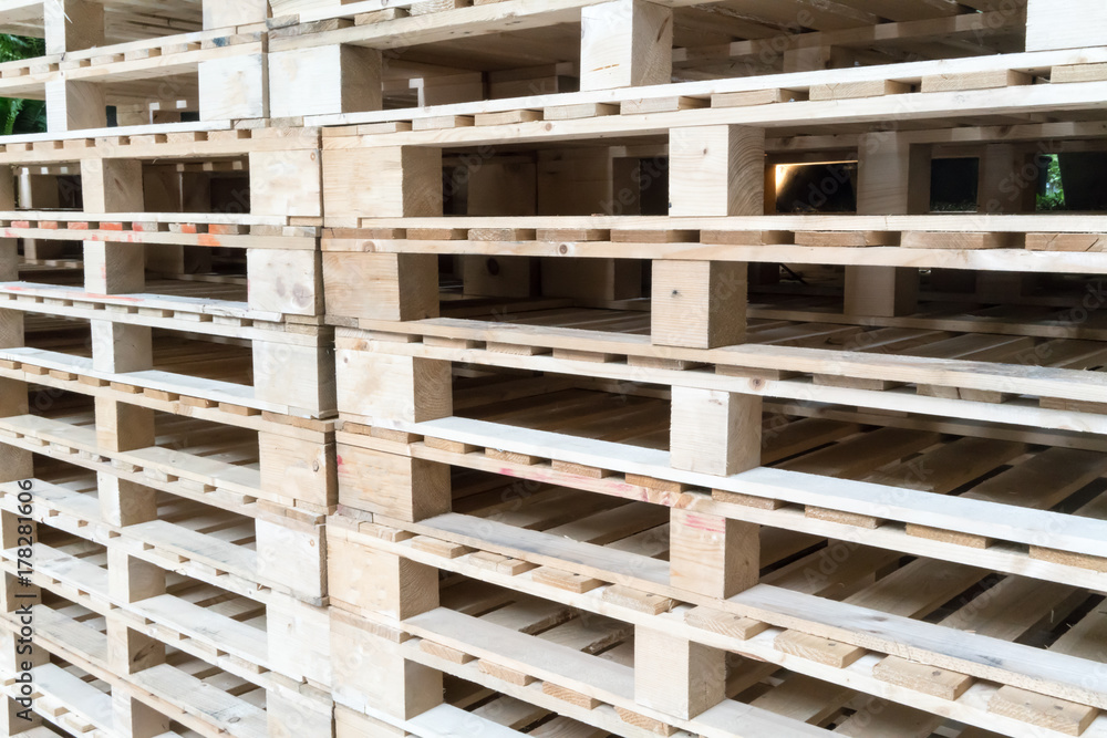 Stack of wooden pallets in factory warehouse Stack of wooden pallets in factory warehouse