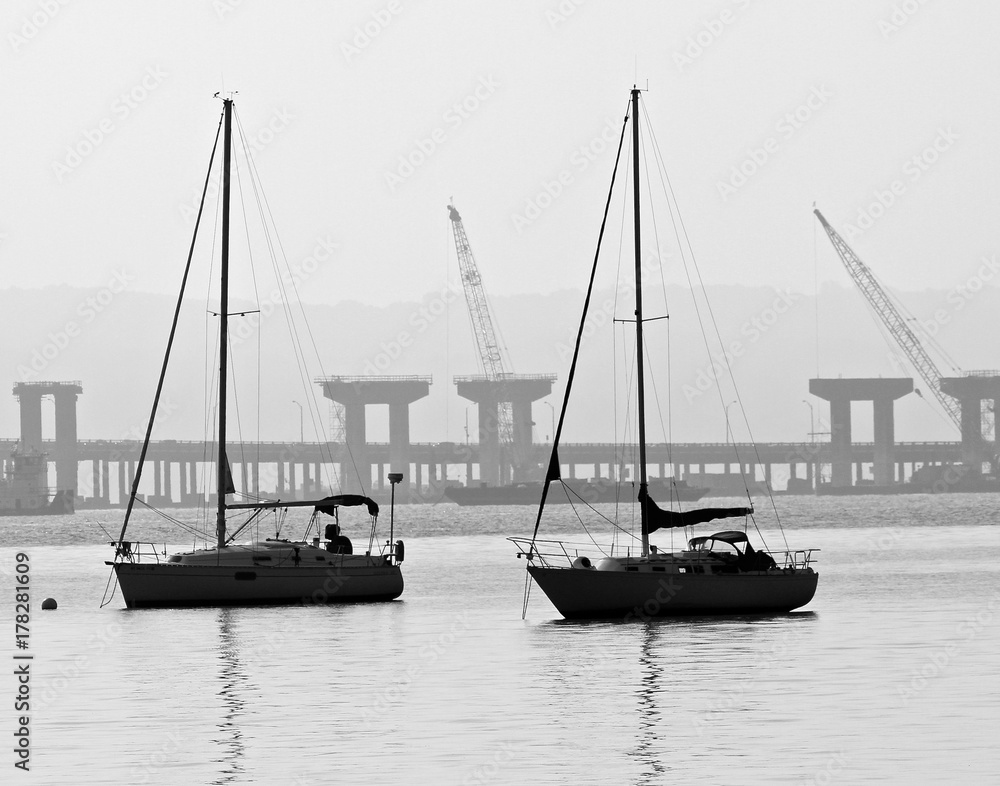 Twin Sailboats in Fog