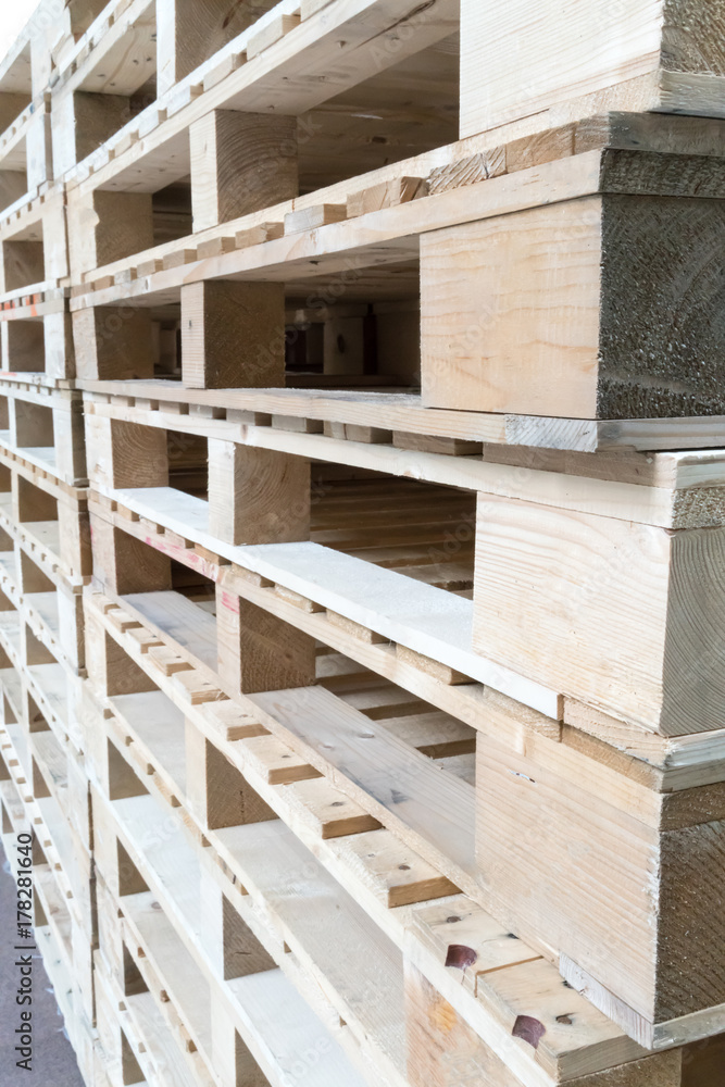 Stack of wooden pallets in factory warehouse Stack of wooden pallets in factory warehouse