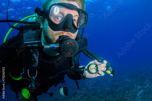 A SCUBA diver running very low on air