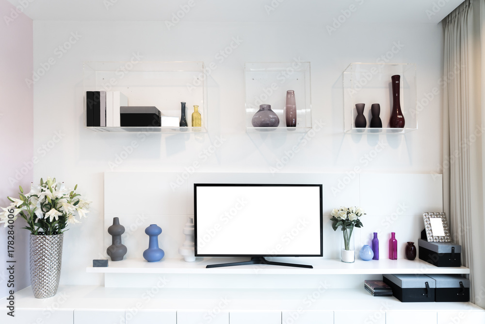TV and shelf in living room Contemporary style. Wood furniture in white with decorative at home. TV and shelf in living room Contemporary style. Wood furniture in white with decorative at home.