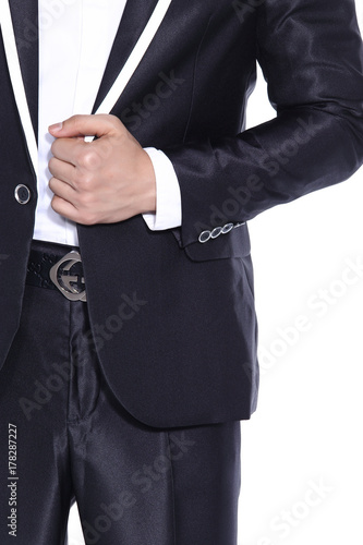 Black shinny Suit tuxido with shoulder and arm of Businessman, black pant white shirt, isolated on studio lighting white background