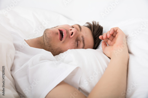 Tired Young Man Snoring