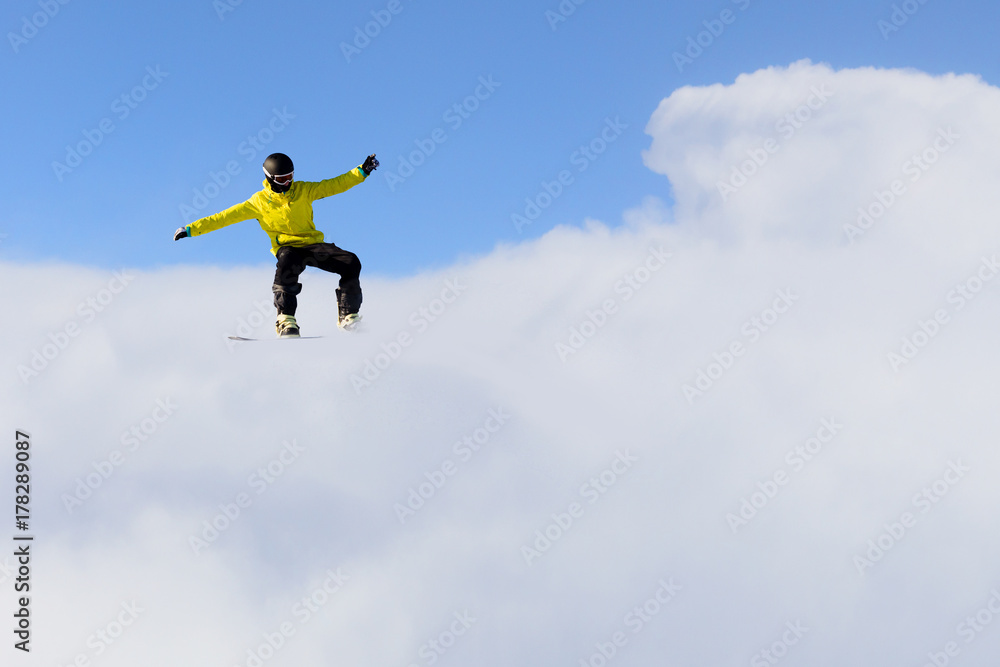 Snowboarder making jump