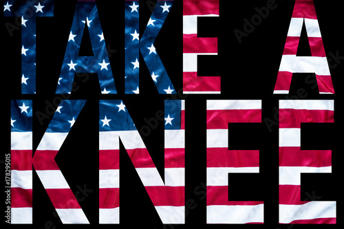 take a knee letters on american flag background with black background