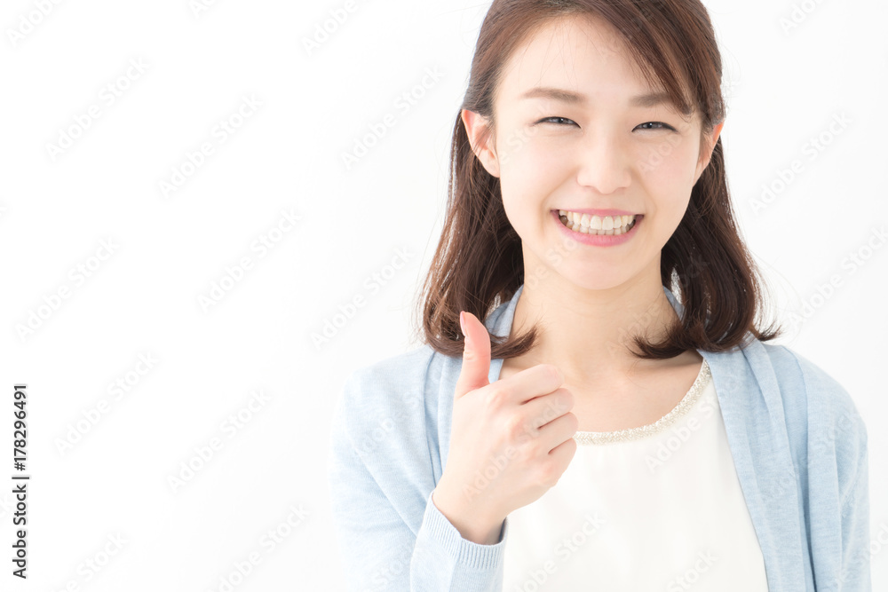 サムズアップ・若い女性 サムズアップ・若い女性