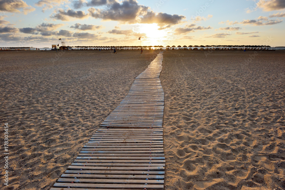 Sea beach wooden walkway path