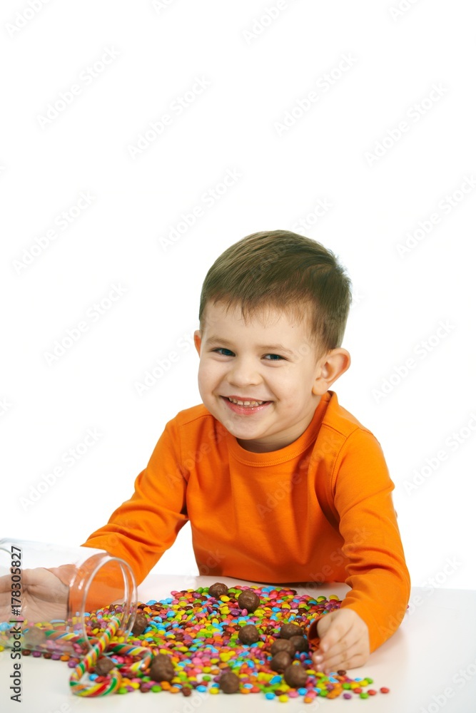 Little boy eating sweets Little boy eating sweets