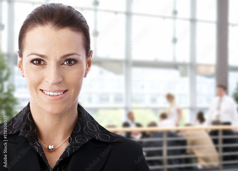 Fototapeta premium Businesswoman in business lobby