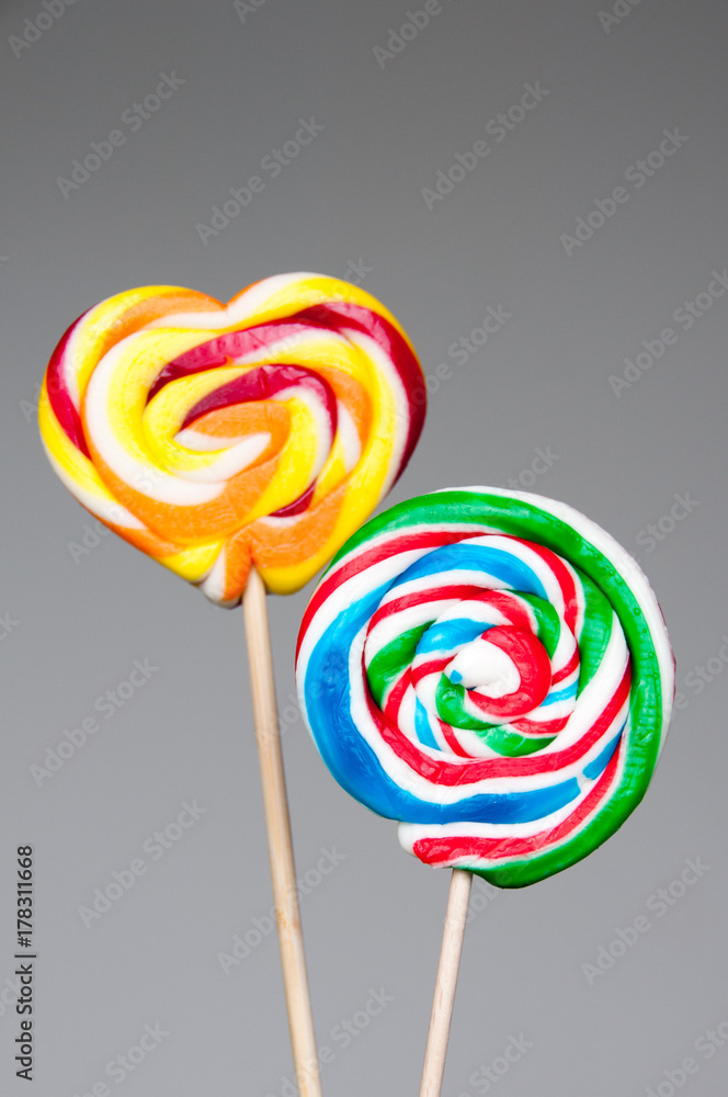 heart shaped lollipops on gray background heart shaped lollipops on gray background