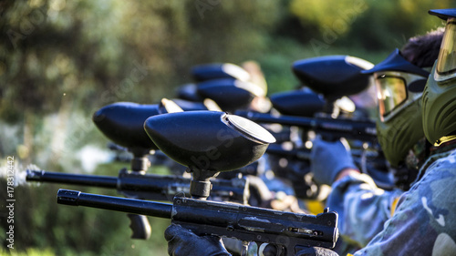 Paintball team shooting
