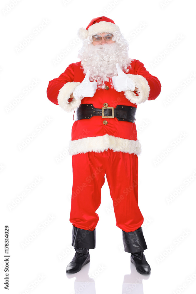 Santa Claus standing with thumbs up or ok isolated on white background. Full length portrait Santa Claus standing with thumbs up or ok isolated on white background. Full length portrait