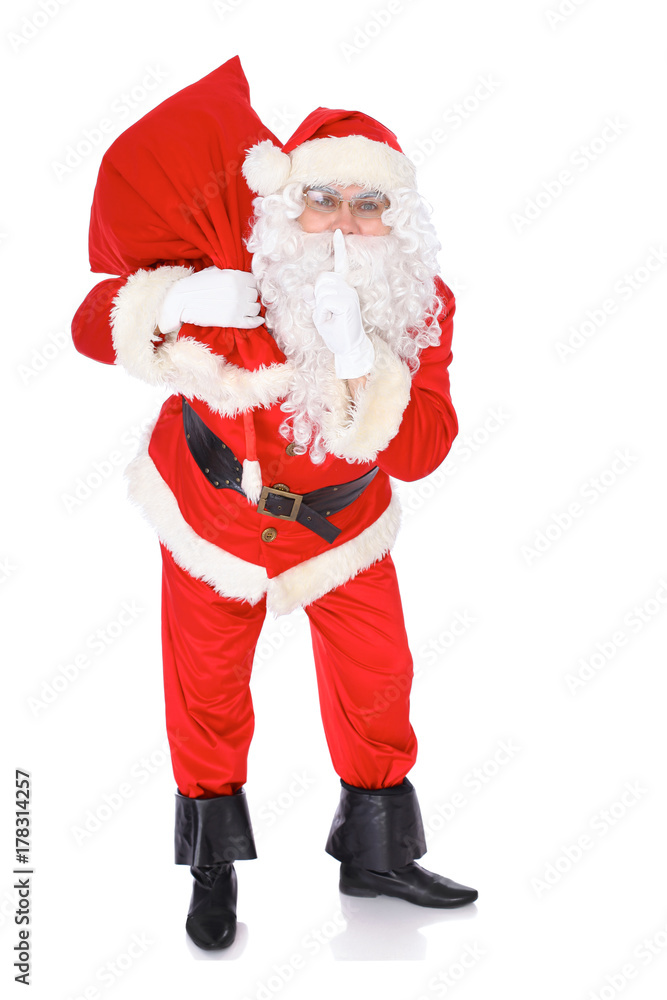 Santa Claus carrying big bag. Isolated on white background. Full length portrait Santa Claus carrying big bag. Isolated on white background. Full length portrait