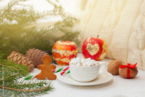 Xmas holidays background, winter home cozy, Homemade christmas gingerbread cookies and caramel candies with a cup of coffee