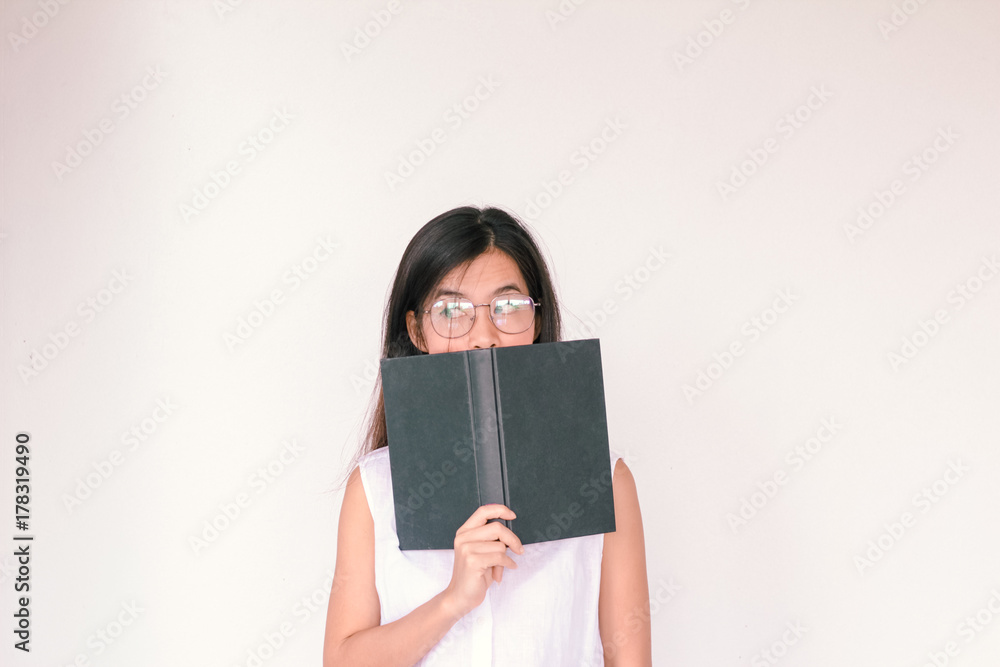 Young asian Student woman holding book with copy space Young asian Student woman holding book with copy space
