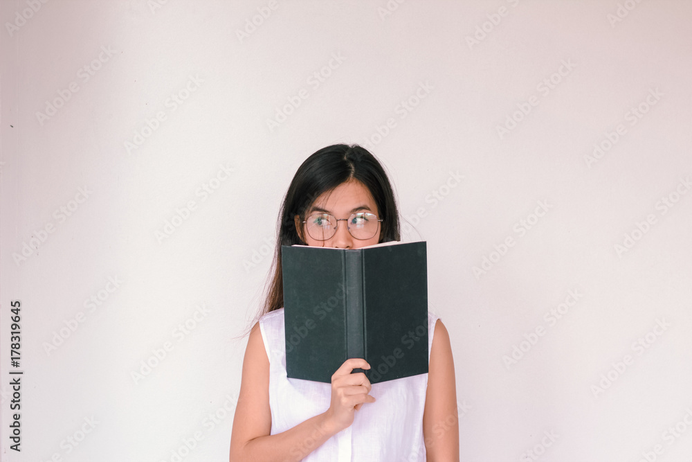 Young asian Student woman holding book with copy space Young asian Student woman holding book with copy space