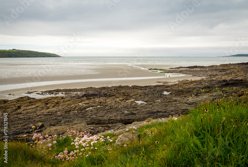 Irish coastline with green hills