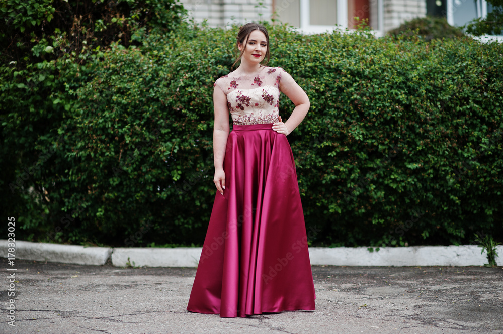 Portrait of a beautiful and gentle girl in elegant gown posing outdoor. Portrait of a beautiful and gentle girl in elegant gown posing outdoor.