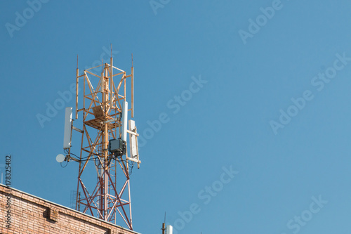 Telecommunications installation on the roof of a building in the city