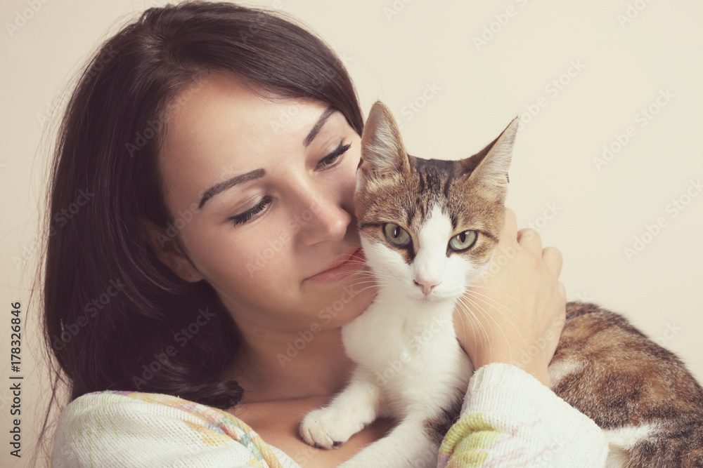 Beautiful girl hugging a cat Beautiful girl hugging a cat