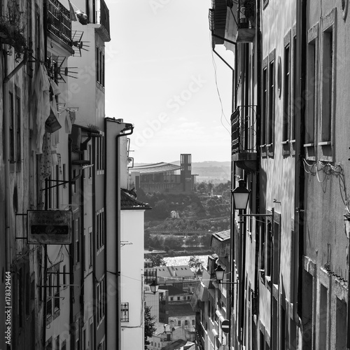 Old Narrow Street in Portuguese Town of Coimbra © GioRez