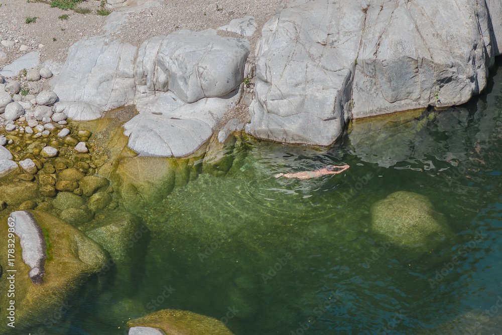 Fototapeta premium Ardeche, gorges, beautiful touristic landscape with people swimming 