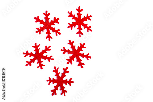 fem röda filt snöflingor isolerade mot vit bakgrund photo