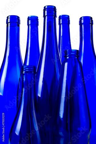 Blue bottles for wine on white background
