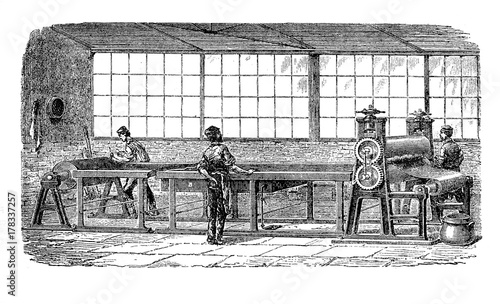XIX century illustration of Mackintosh or waterproof raincoat production with rubberized fabric Stock Illustration Adobe Stock
