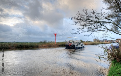 Foto Dutch landscape with water canals