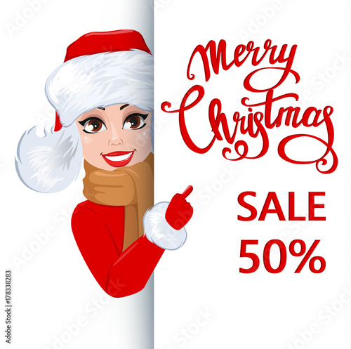 Pretty woman standing behind a sign and showing on white placard with lettering