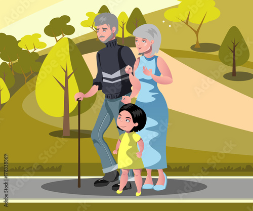 Grandparents with grandchildren walking.