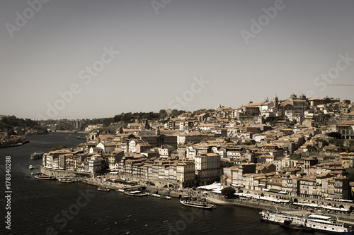 Fototapeta Naklejka Na Ścianę i Meble -  Top view of Douro river and old Porto downtown, Portugal.
