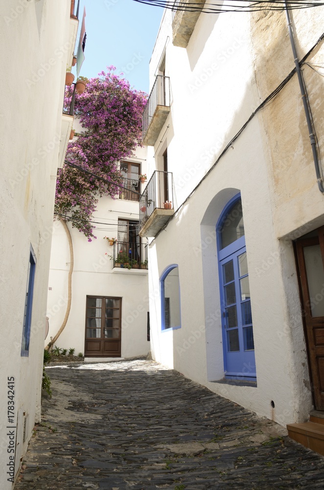 White alley in Cadaques, Girona, Spain.